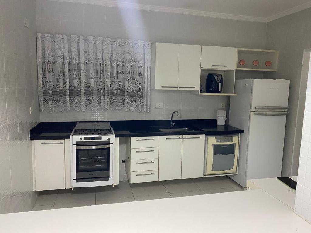 Ap Familia Busca-pe Enseada Apartment Guaruja